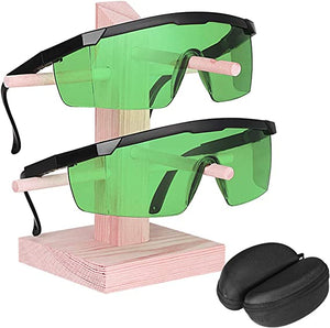 comgrow green laser safety glasses on a wooden rack